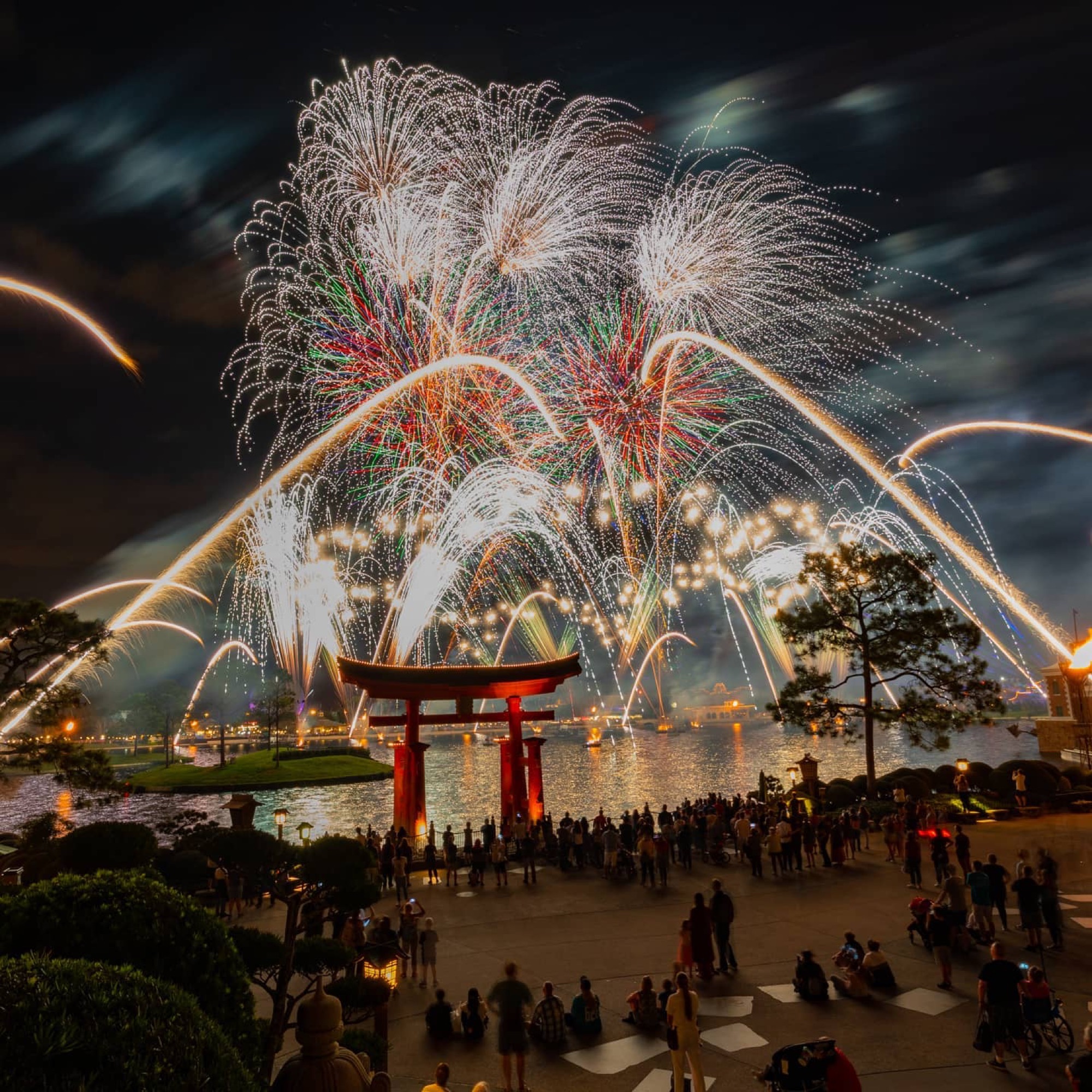 Fireworks bursting over the Japanese torii gate at EPCOT