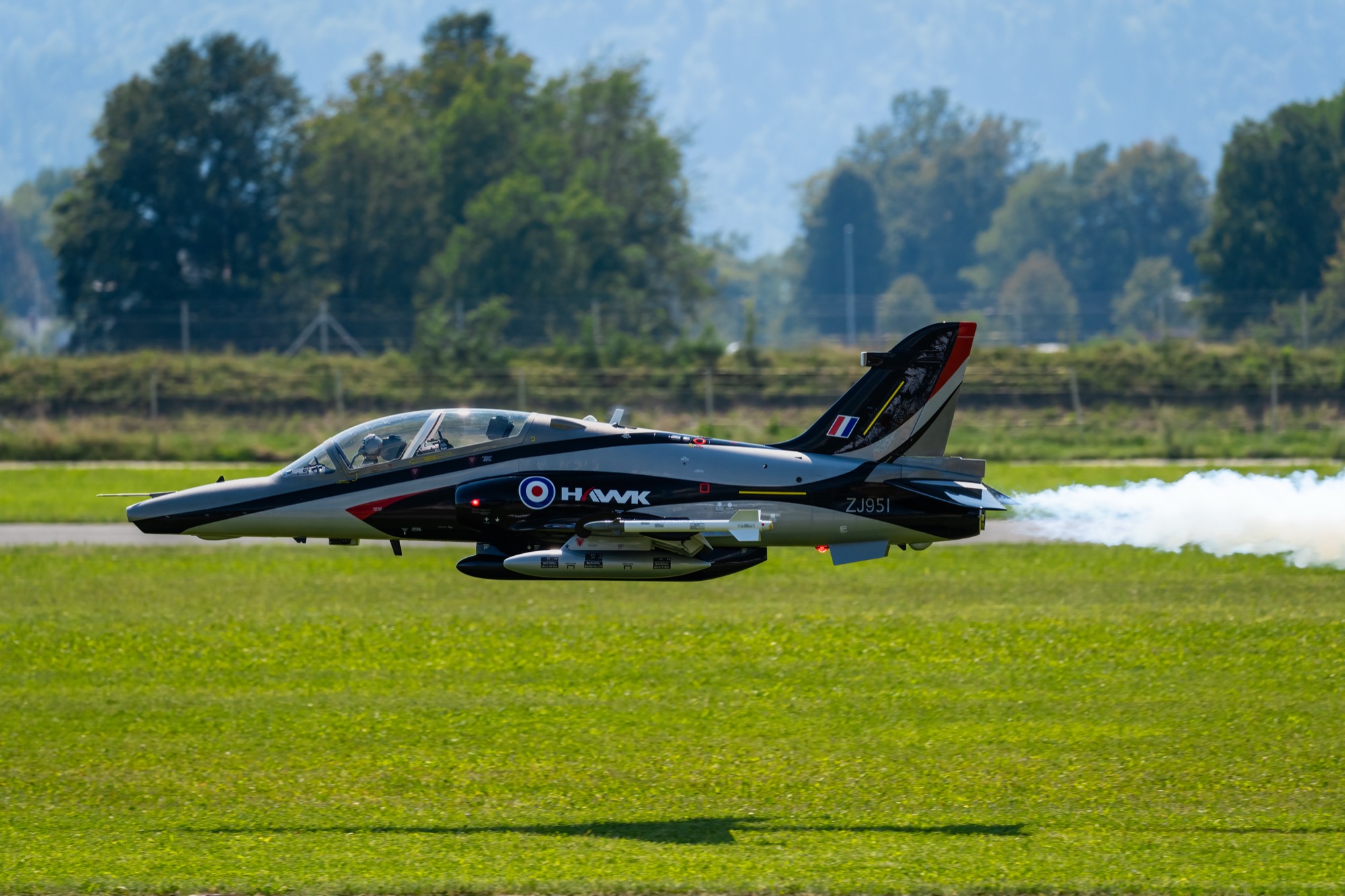 Hawk jet taking off at an airshow