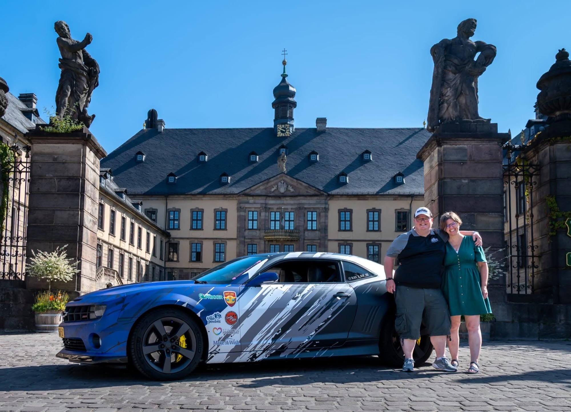 Jurjen and Ilonka with the Camaro during the fundraiser rally